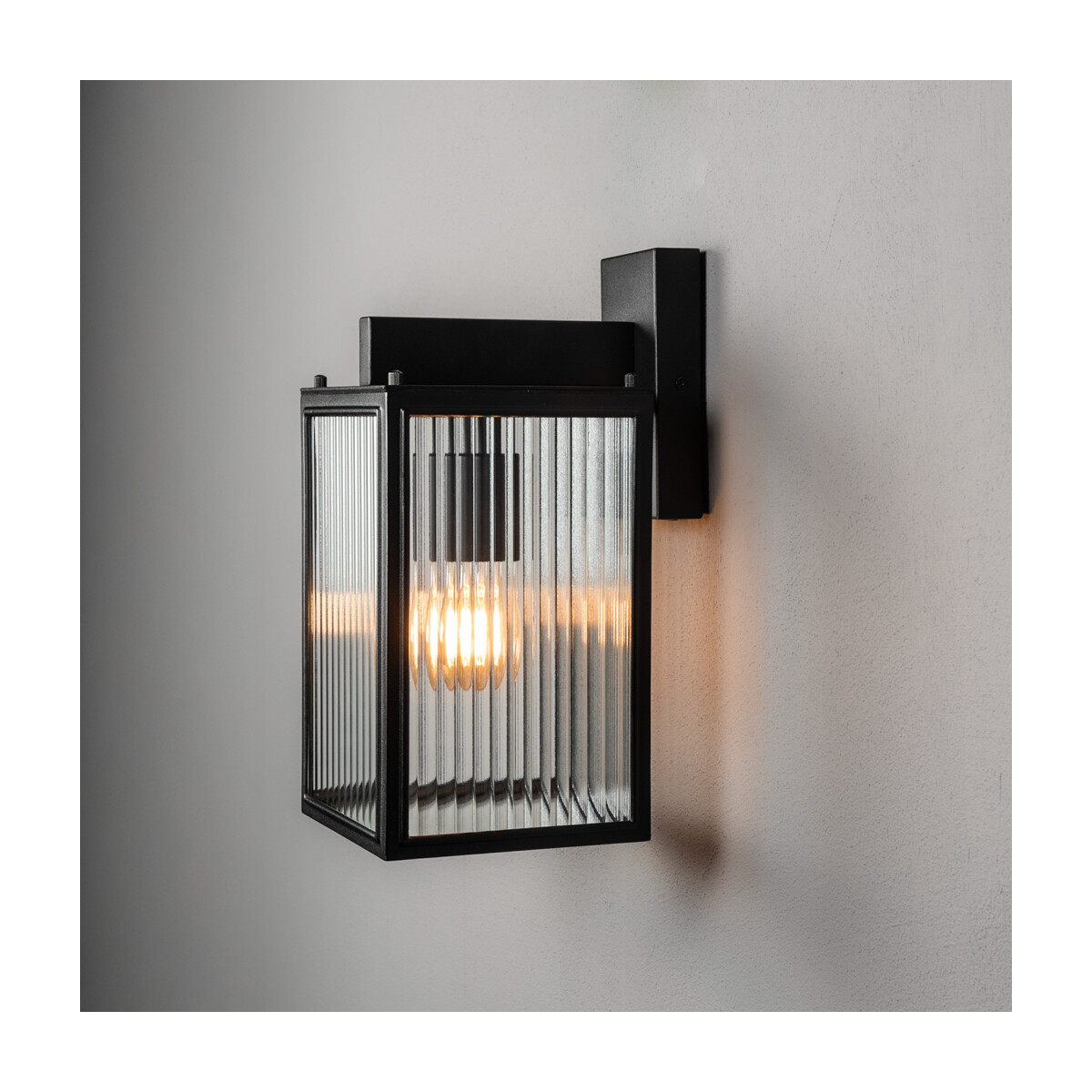 Carpi Wandleuchte auf/ab gestreiftes Glas schwarz